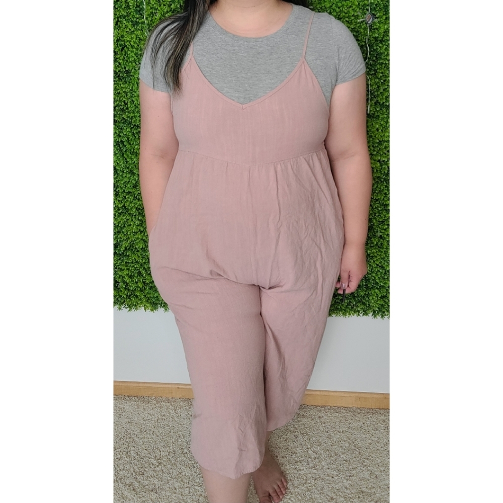 Light pink overall/jumpsuit.